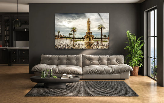 Featuring muted color saturation, this glass wall art wall prints of the Izmir Clock Tower captures a dramatic landscape at sunset with rich textures.