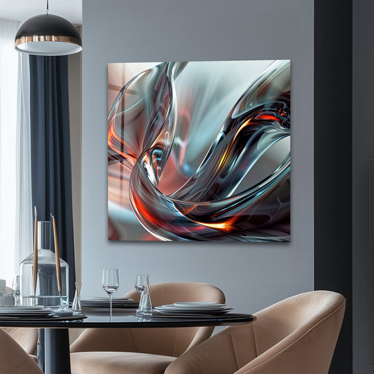 An abstract glass wall art print displays flowing, glossy chrome and ember-red fiery textures with a polished, high-quality finish.