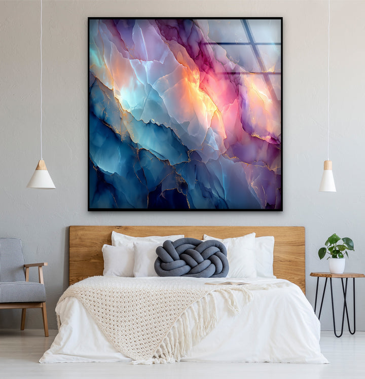 The glossy, reflective finish of the Aurora Vein Fusion abstract marble glass art painting captivates with blue and pink hues.