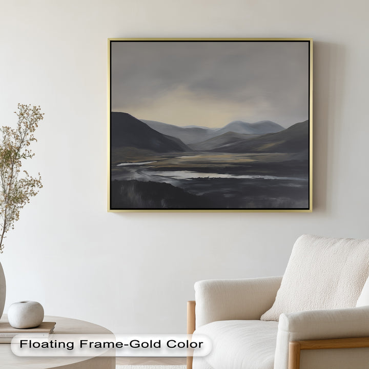 A nature scene in dark tones, with misty and calm surroundings, featuring mountains under a faint daylight horizon.

