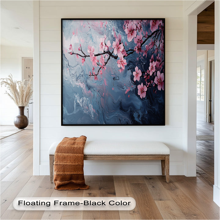 A tranquil artwork featuring a blossoming branch of pink flowers set against a moody, flowing backdrop of indigo and blush hues.