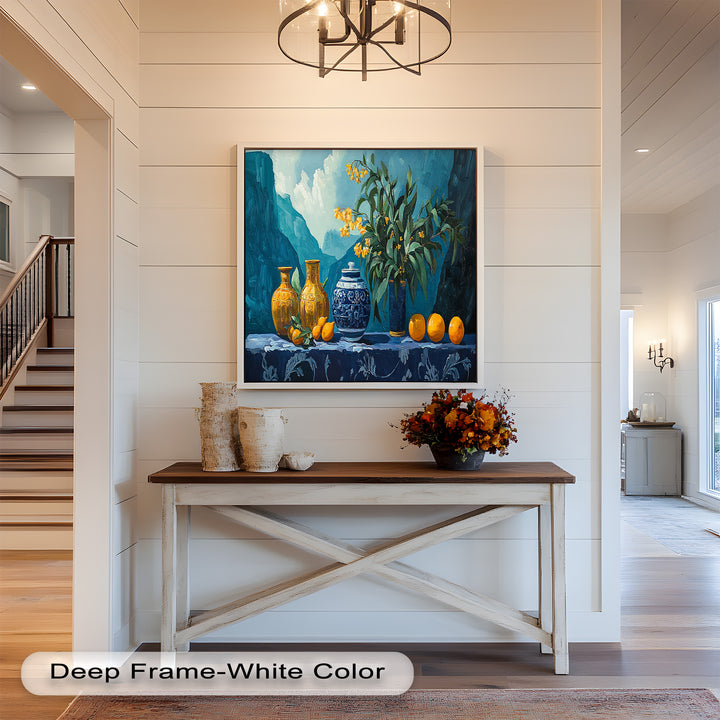 The serene mountain scenery enhances the vivid foreground of citrus fruits and ornate pottery, creating a rich and harmonious composition.

