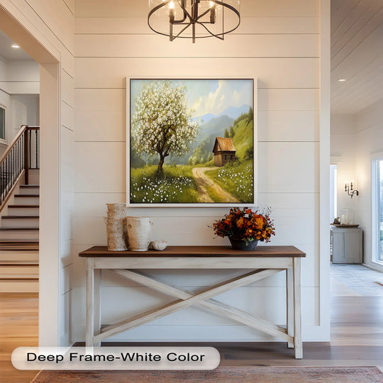 Captured in exquisite detail, the central subject is an oil painting art piece featuring a blooming meadow path and rustic cabin, providing a calming landscape scene.