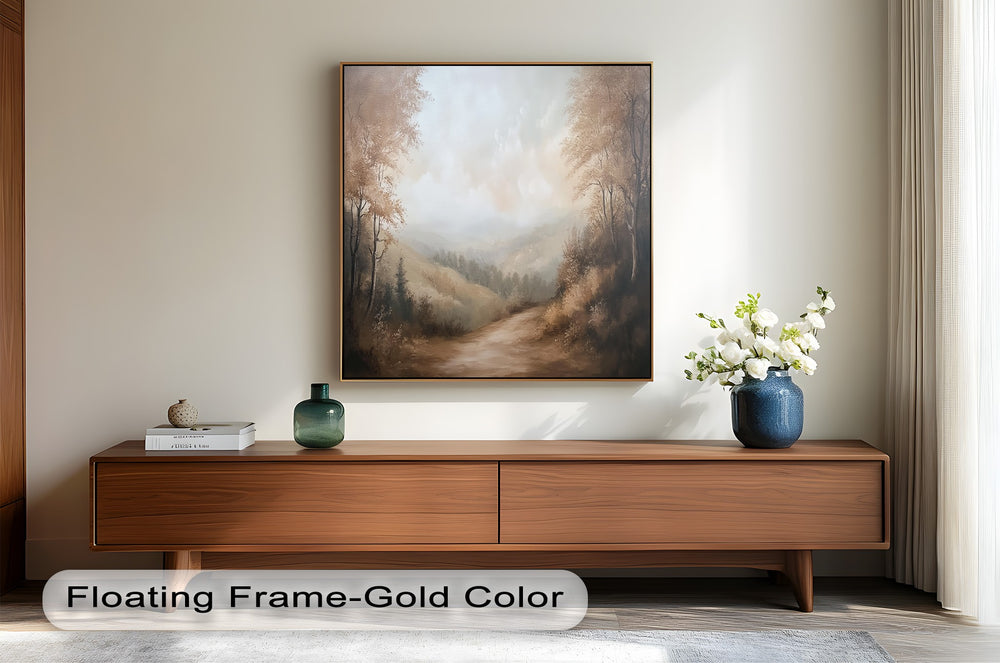 Tranquil countryside scene featuring muted tones and a winding trail.
