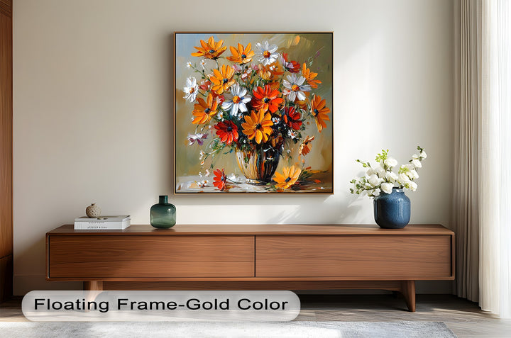 Bright floral still life with a golden vase and wild blooms.

