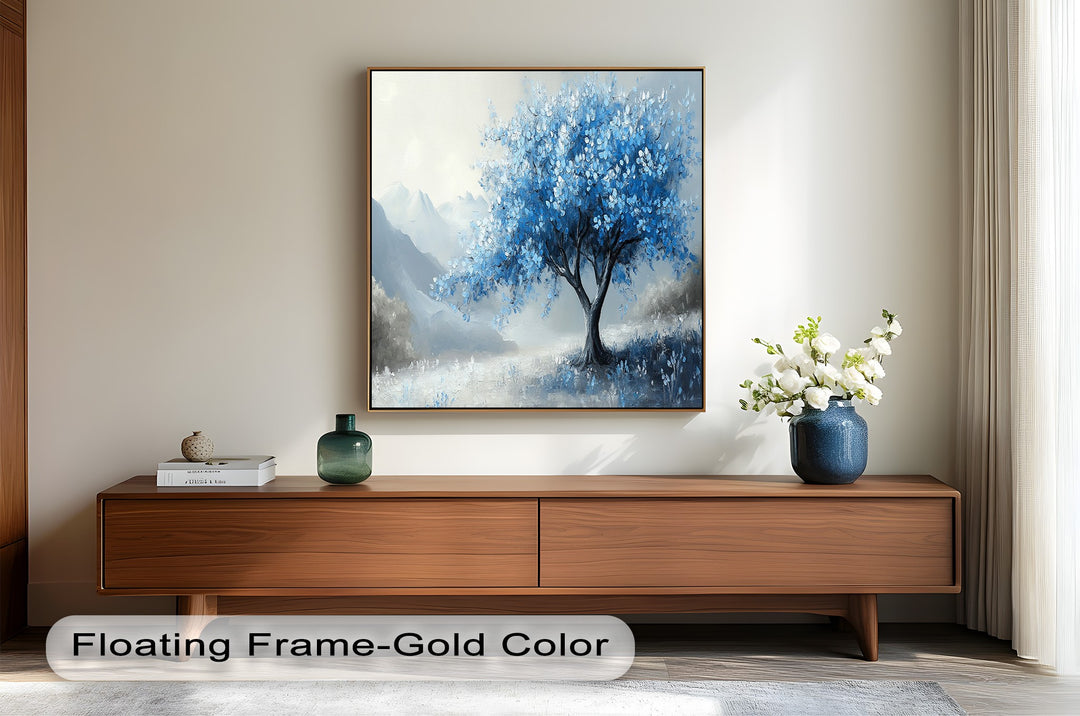 Impressionist tree with sapphire leaves in a foggy valley.
