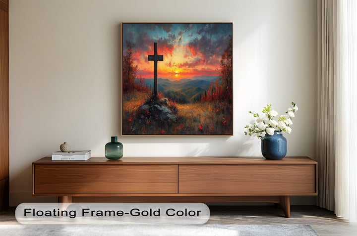 Dramatic sunset over mountains with a cross at the summit.
