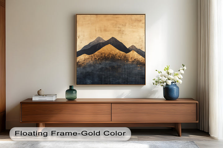 Contemporary mountain wall art in metallic gold and charcoal black tones.
