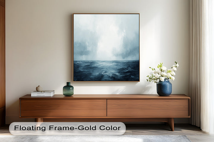 Serene marine artwork with gentle waves and light-filled sky.
