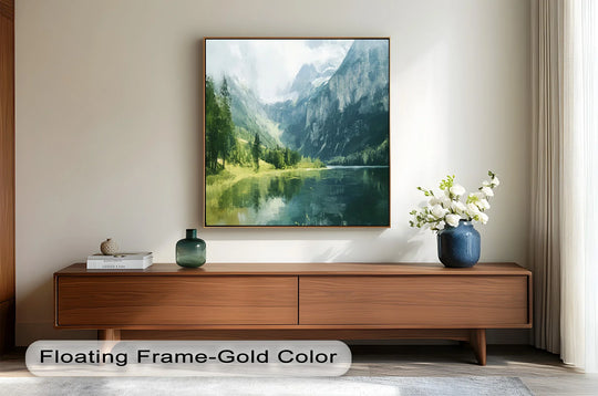 The central subject of this mountain with a lake scene is a breathtaking oil painting reproduction print featuring a gold floating frame, set above a wooden console table for added home decor.
