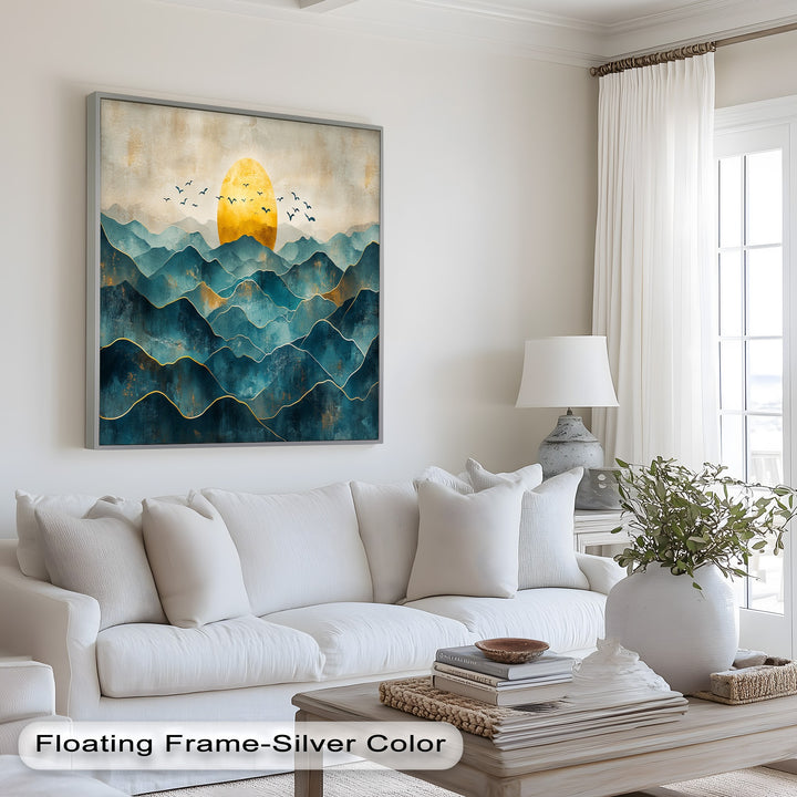 Textured mountain wall art with rising sun and layered peaks.
