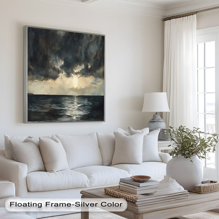 Twilight sea view with brooding clouds and golden sunbeam reflection.
