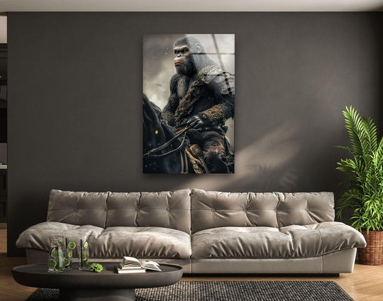 Chromatic hanging wall art highlights the transition from the armored gorilla rider's dark fur to the light smoky background in this glass wall art.