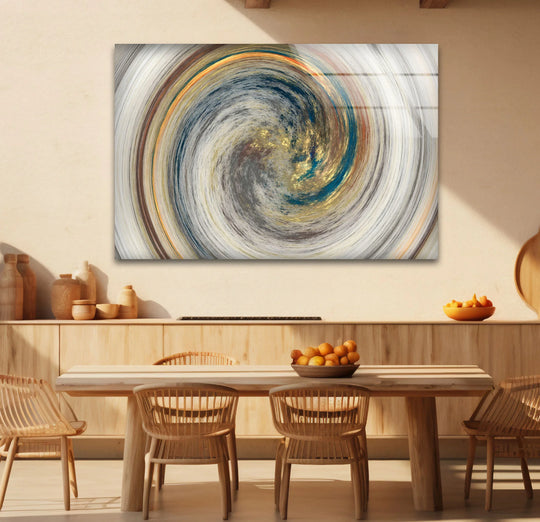 A golden spiral vortex glass art print captures dynamic swirling movement with streaks of gold, navy, and white.