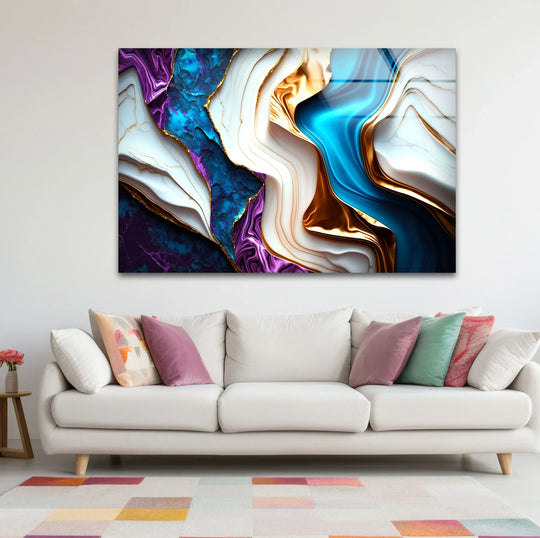 A vibrant glass wall art decor piece showcases realistic, swirling veins of sapphire blue, amethyst purple, and liquid gold against a white marble background.