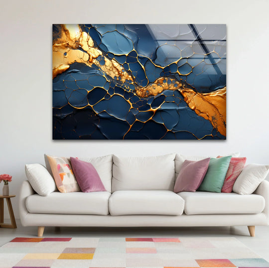 Dark blue and gold cracked fluid abstract glass wall prints swirl dynamically across the wall.