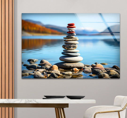 Aching for serenity, this stacked stones glass wall art evokes a mood of tranquil balance in a peaceful lake scene, perfect as decorative wall art.