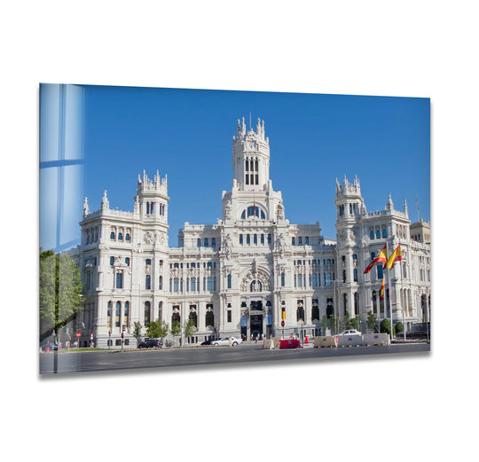 Highlighting its white facade, the brightest area showcases Madrid’s Palacio de Cibeles on home decor glass wall art, a captivating architectural masterpiece.
