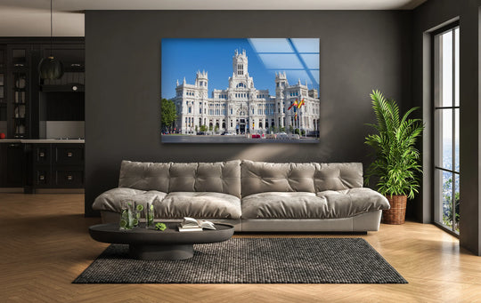 Smooth surface texture showcases the Palacio de Cibeles, Madrid’s architectural masterpiece, in this stunning decorative wall art, highlighting its intricate details under a clear blue sky.