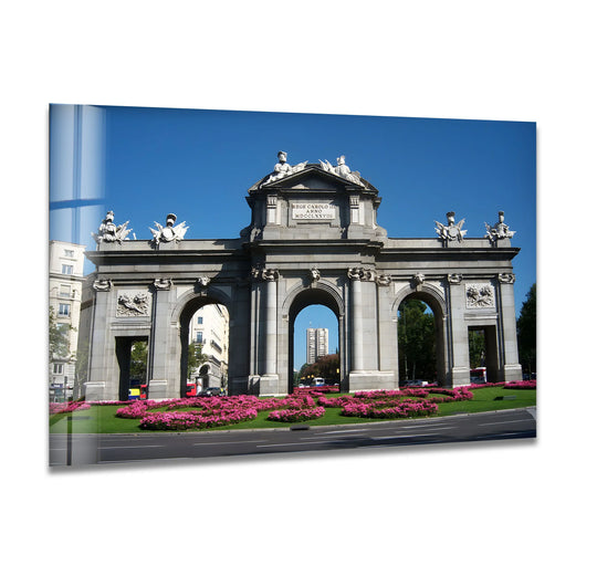 Inviting, the Puerta de Alcalá glass wall art evokes a travel mood and brings iconic Madrid monument charm as a piece of home decoration to your space.