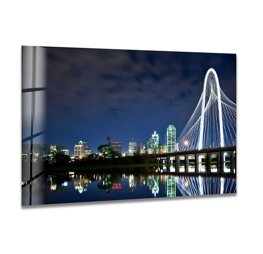 Darkest reflections beneath the Margaret Hunt Hill Bridge capture the Dallas skyline's twinkling lights in this wall art prints piece, a striking cityscape on glass.