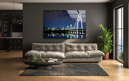 Bold color contrast highlights the stunning Dallas skyline in these glass wall prints, featuring the illuminated Margaret Hunt Hill Bridge against a dark night sky.