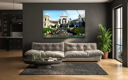 Negative space frames the Palais des Festivals, a captivating glass art painting, highlighting its majestic fountain and intricate architecture against the dark wall.