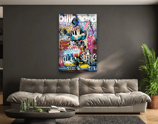Mickey Mouse, the central subject, is surrounded by colorful graffiti and inspiring quotes, showcasing a modern hanging wall art design in this Dream It, Do It piece.