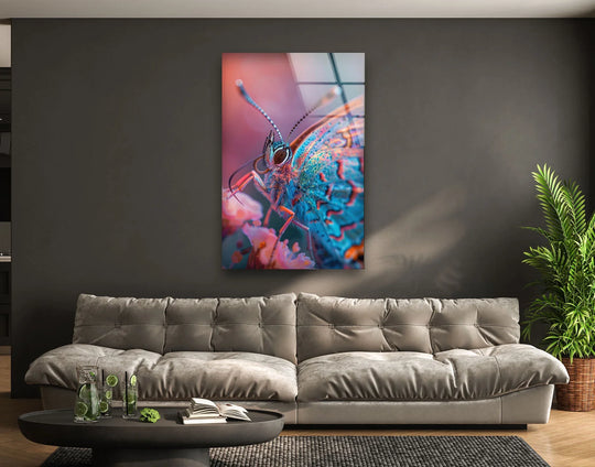 Vibrant blue and pink butterfly on glass wall art, perfect for animal home decor, features a warm color temperature.