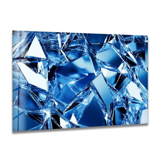 Layered shards of blue ice glass create a dynamic shatter effect, a striking piece of art from glass.