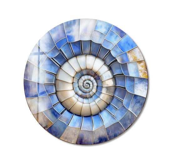 The background of this round ocean spiral shell glass art features a mesmerizing mosaic of blue and beige tones, accentuating the central nautilus-like glass art design.
