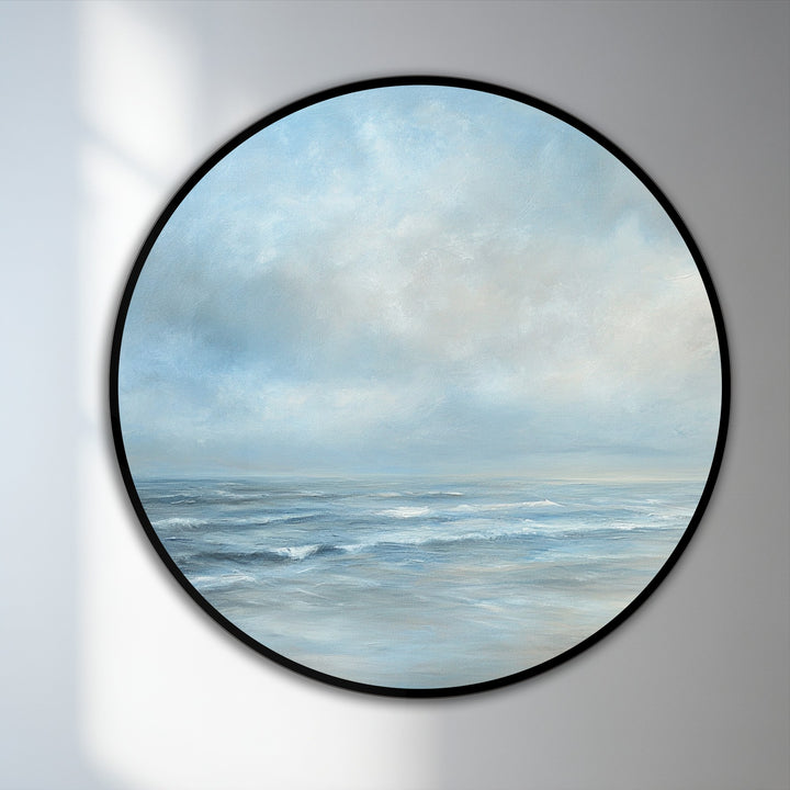 The focal point of this round oil painting showcases the soft, blurred brushstrokes that define the serene seascape in this coastal oil painting home decor piece.