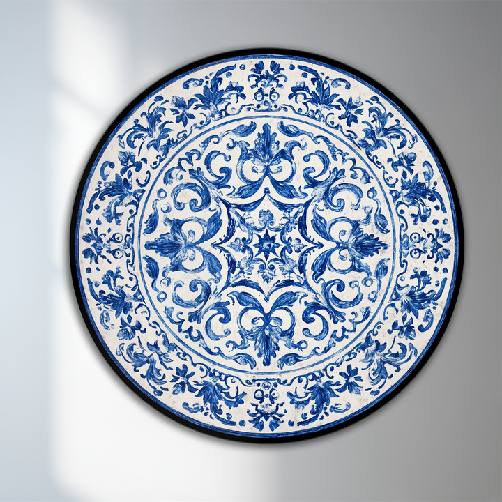 The stillness of this classic oil painting art highlights the ornate, plate-style round design featuring intricate blue ornamental patterns and a timeless motif.