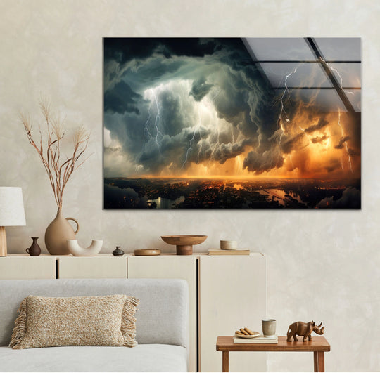 Displaying impressive depth and layers, this glass print features a decorative wall art thunderstorm cityscape with strikes of lightning illuminating the stormy sky.