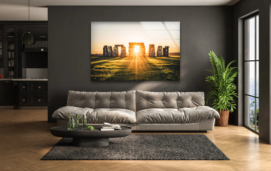 Negative space around the Stonehenge sunrise monument highlights the details of the tempered glass wall art, creating depth and enhancing the sun's warm glow.