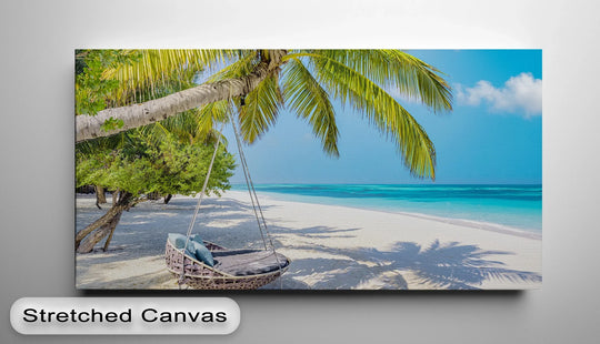 Highlighted by the visible surface texture, this landscape canvas print showcases the details of the best canvas prints, capturing the sandy beach and palm tree shadows.