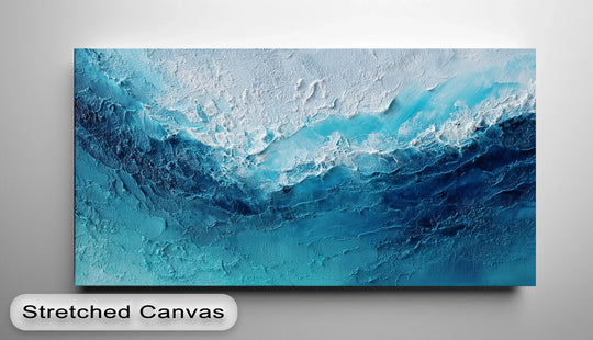 Cool blues and whites dominate this textural canvas pictures art, creating a calming yet dramatic color temperature in the deep blue ocean texture canvas print.