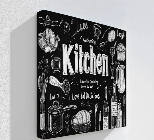 Negative space defines the hand-drawn lettering and kitchen motifs of this 'Gather in the Kitchen' canvas wall decor, creating a modern chalkboard aesthetic.