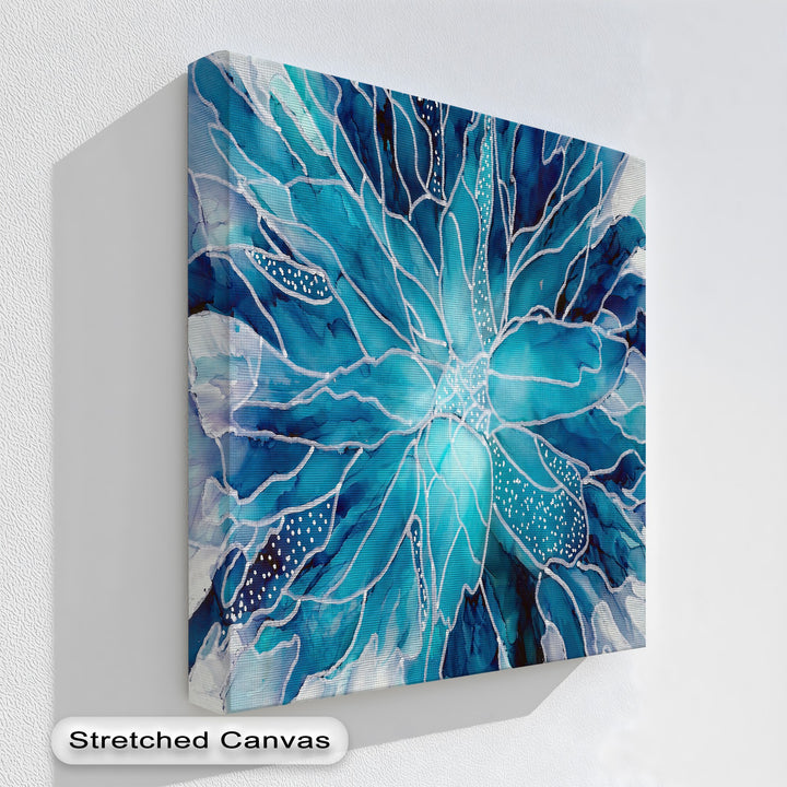 The unique canvas print displays a vibrant transition from deep navy to bright turquoise, featuring an abstract blue watercolor floral design with delicate white lines.