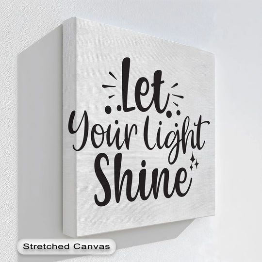 Cool color temperature highlights the crisp white background of this premium canvas decor, showcasing the motivational 'Let Your Light Shine' modern script print.