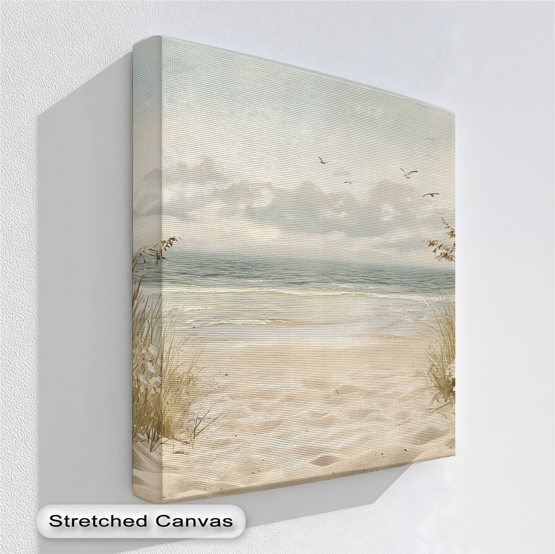 Step into serenity with this coastal beach canvas wall art, showcasing a sandy path to the ocean framed by coastal grasses and a soft, dreamy sky.

