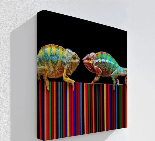 Foreground striped pencils provide a vibrant base for the detailed chameleons in this Color Clash canvas artwork.