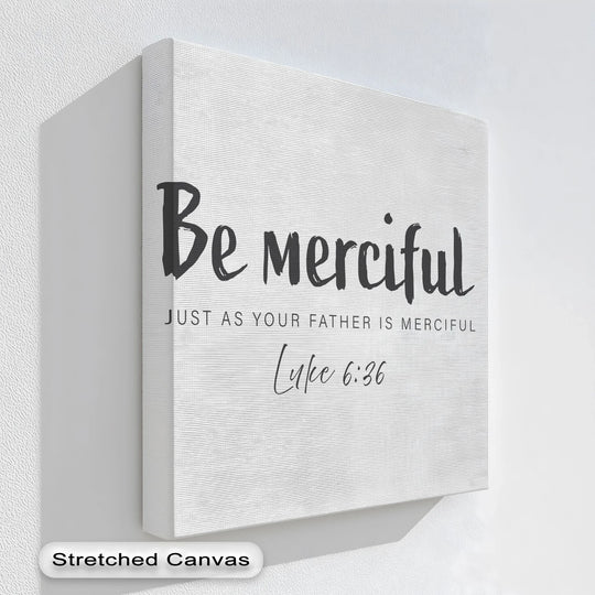 Softly textured background provides a subtle contrast to the inspiring message of the 'Be Merciful' scripture canvas print, enhancing the hanging canvas.