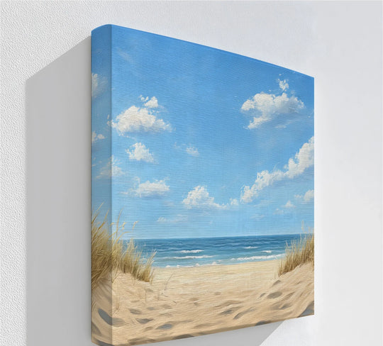 Dominant negative space surrounds the sandy shoreline view in this framed canvas artwork, drawing the eye to the serene beach scene.