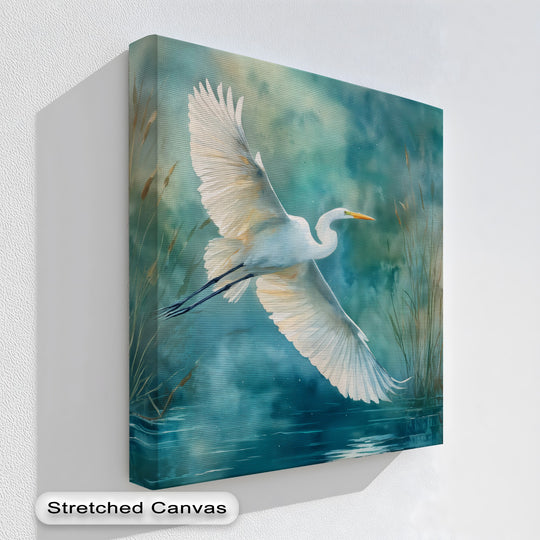 Teal hues dominate this elegant white heron nature canvas artwork print, depicting a graceful flying bird over a serene, watery landscape.
