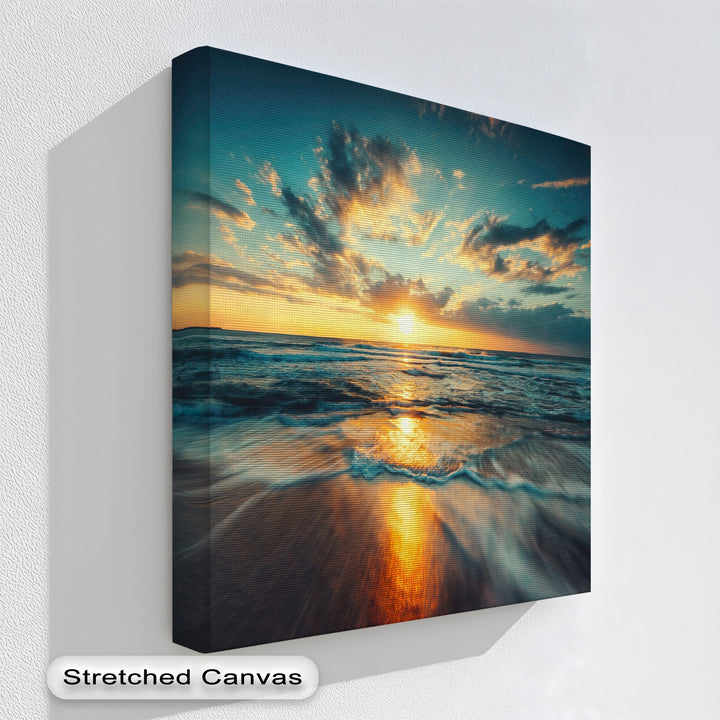 Incredible color saturation defines this golden ocean sunset canvas wall art, vividly portraying reflective waves and clouds, a peaceful beach wall art.