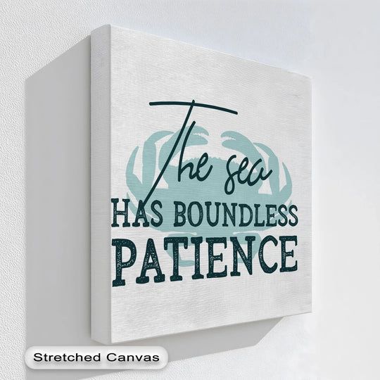 Visible behind the 'Boundless Patience' inspirational ocean quote canvas print is a textured wall, creating a subtle backdrop for the framed canvas artwork.