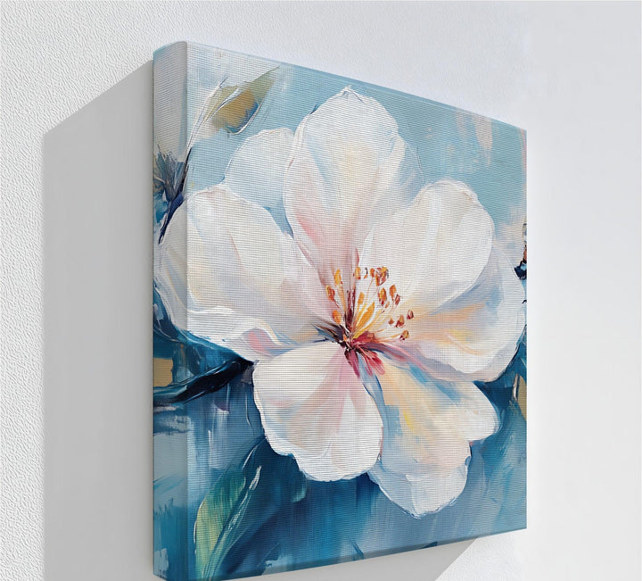 Blossom Grace – light pink flower on blue canvas wall art.

