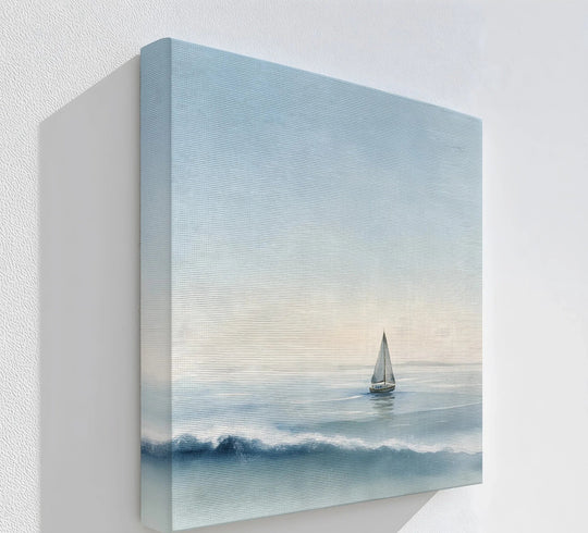The brightest area highlights the minimalist ocean horizon in this serene sailboat on tranquil waters canvas art print, offering a peaceful scene.