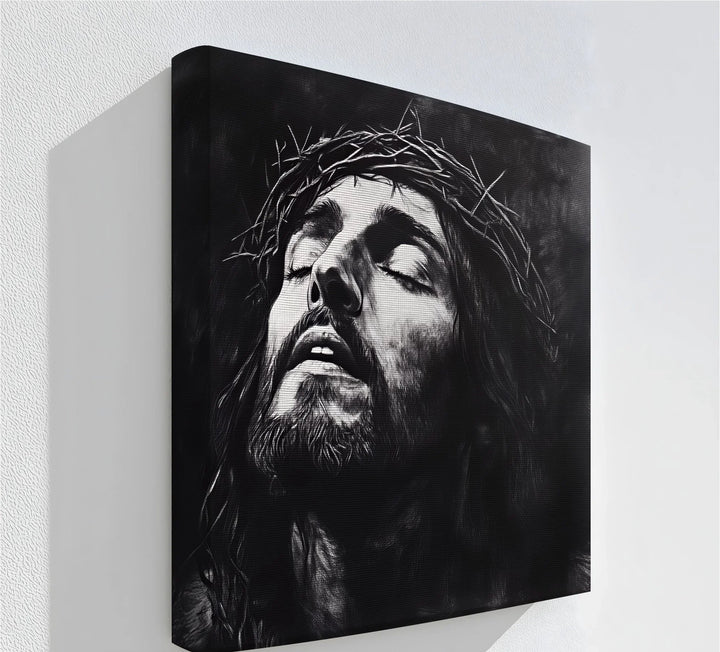 Emotive Jesus crown of thorns canvas print in bold black and white.

